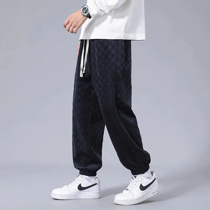 Plush, ultra-soft unisex sweatpants, relaxed fit design ensures maximum comfort for lounging.