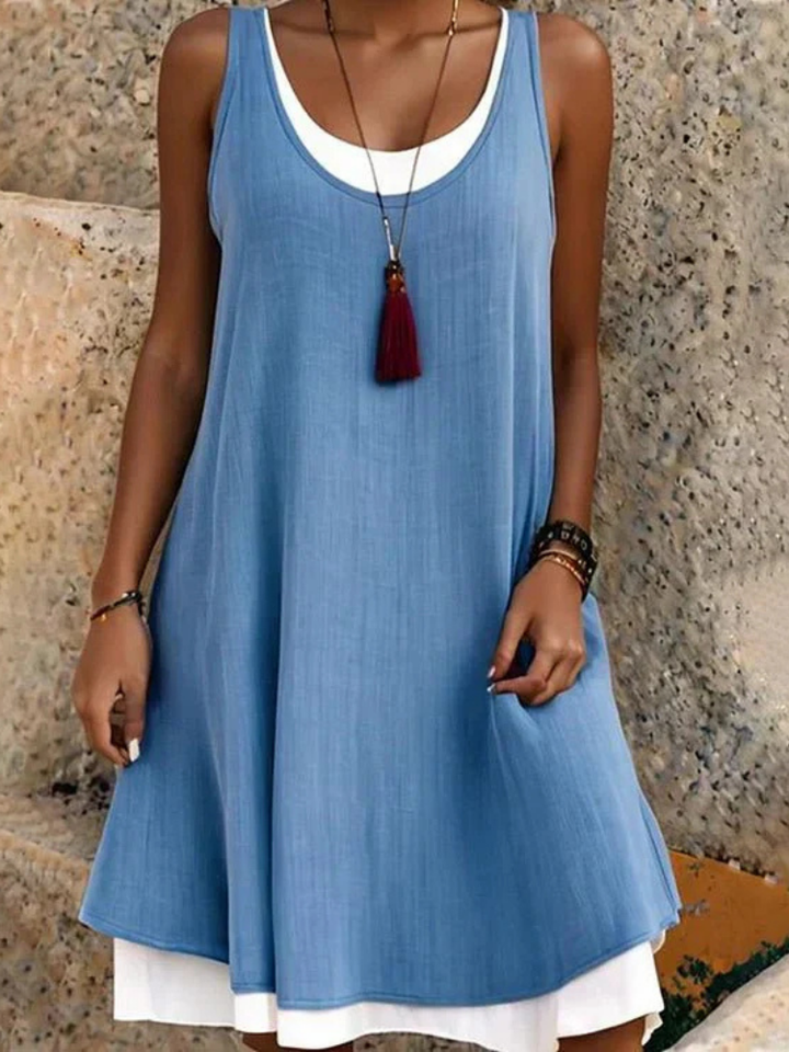 Stylish women's sleeveless A-line midi dress with a scoop neck and two layers, ideal for easy wear.