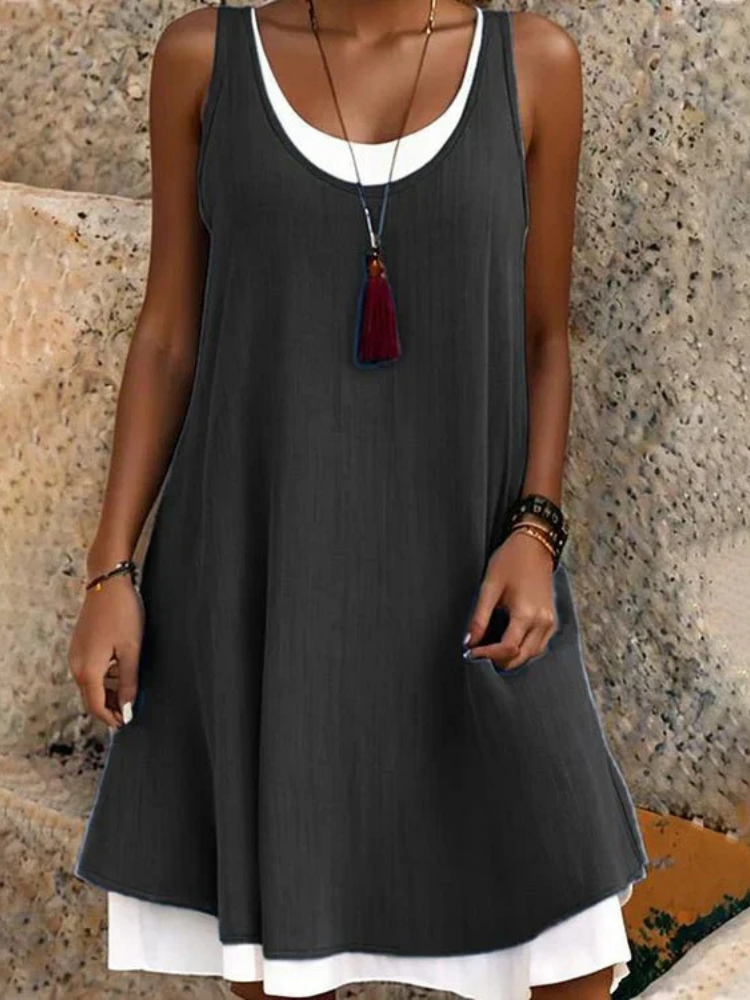 Effortless women's two-layer scoop neck sleeveless A-line dress, perfect for casual summer comfort.