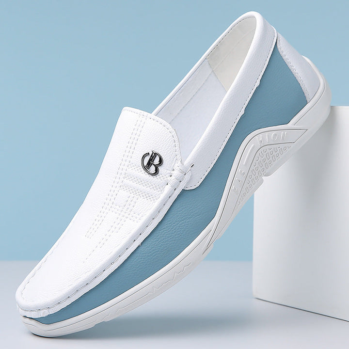 Men's stylish two-tone loafers, offering elegant slip-on comfort for various occasions.