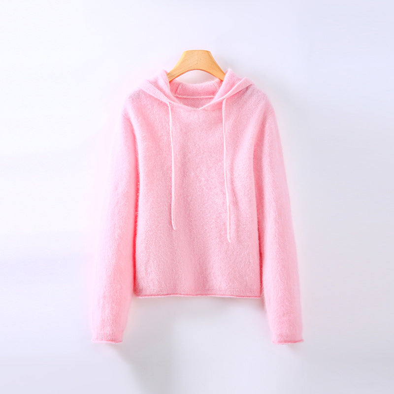 Elegant pink women's hoodie, soft & warm knitwear for comfortable everyday style.