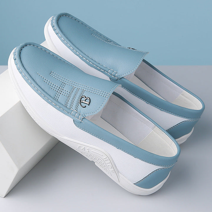 Chic men's two-tone slip-on loafers, perfect for adding an elegant touch to your look.
