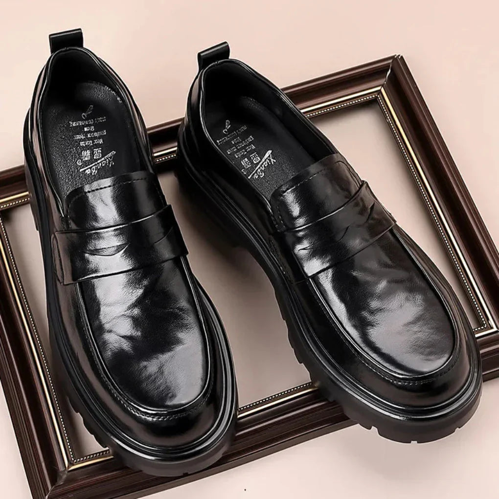 Men's classic penny strap moc toe loafers in brown leather, perfect for refined style, dress, or casual wear.
