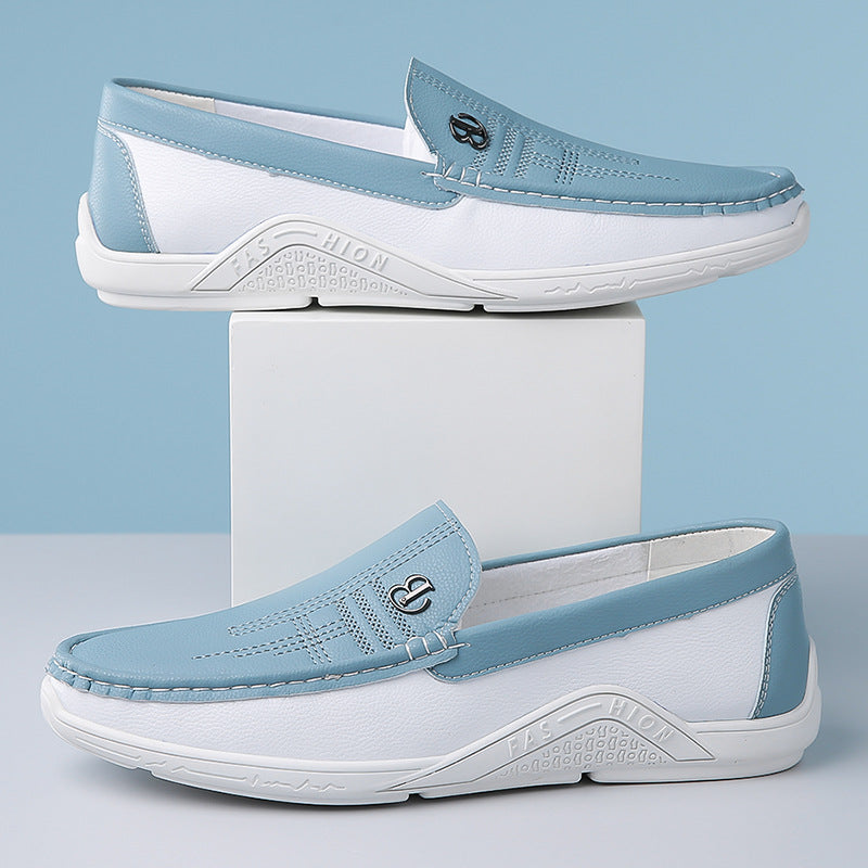 Men's formal two-tone loafers, sleek slip-on design for a sophisticated outfit.