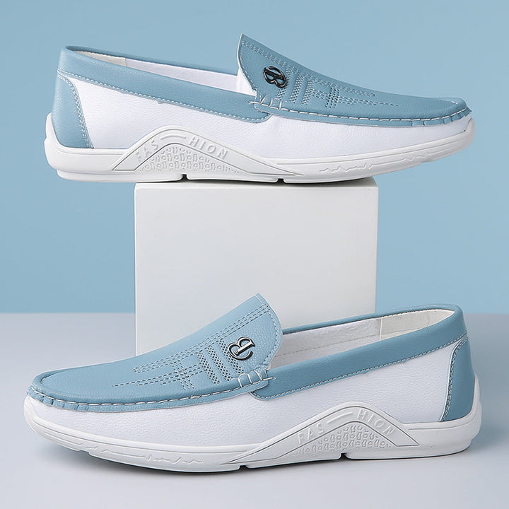 Men's formal two-tone loafers, sleek slip-on design for a sophisticated outfit.