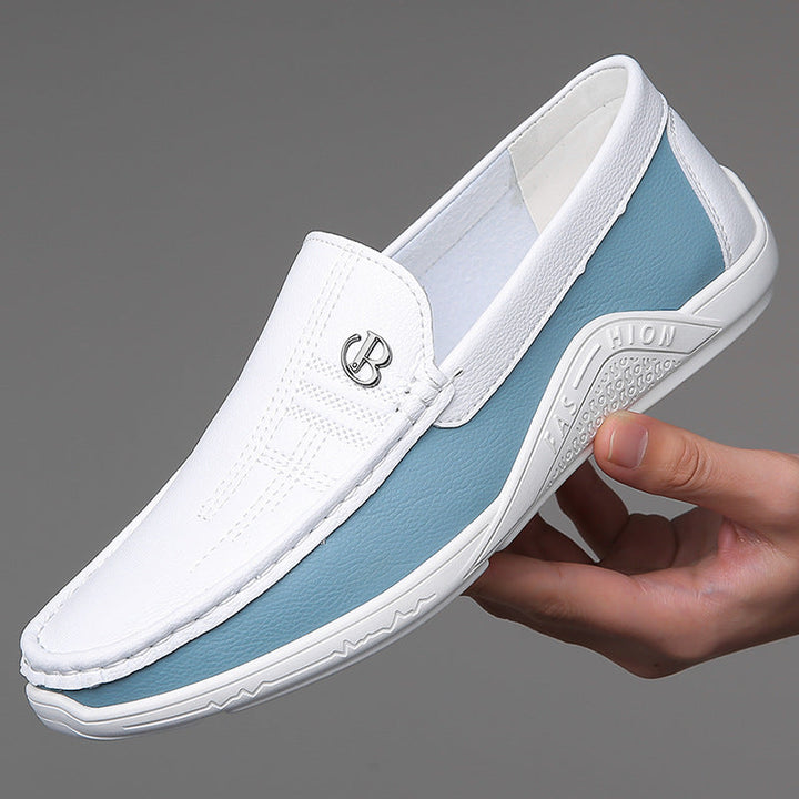 Premium men's two-tone loafers, delivering elegant slip-on comfort for discerning tastes.