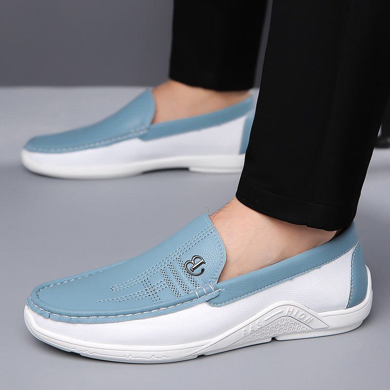 Versatile men's two-tone loafers, a stylish slip-on option for both casual and formal events.
