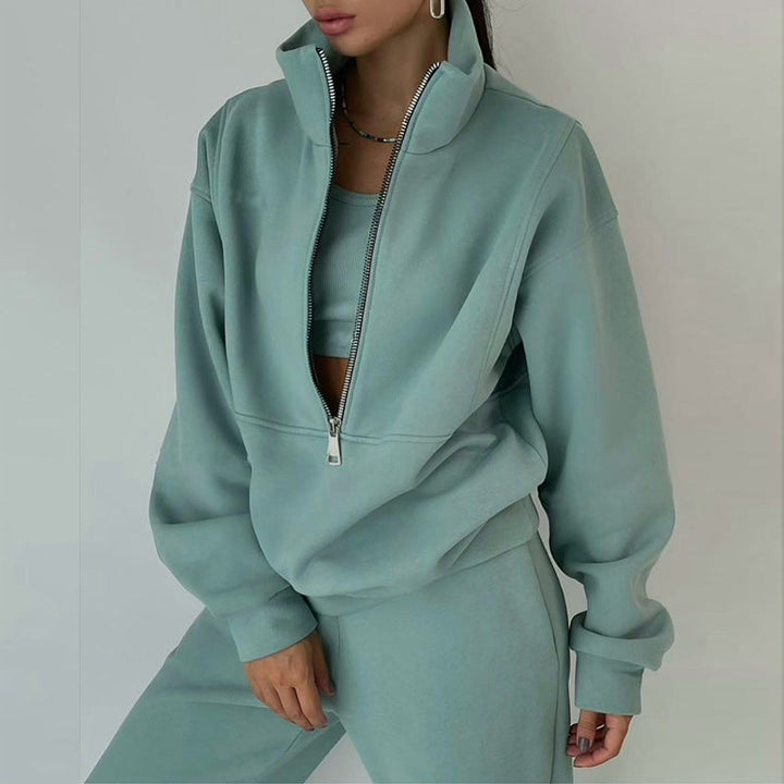 Modern women's fashion: a 2-piece loungewear set with a half-zip pullover and high-waisted joggers.