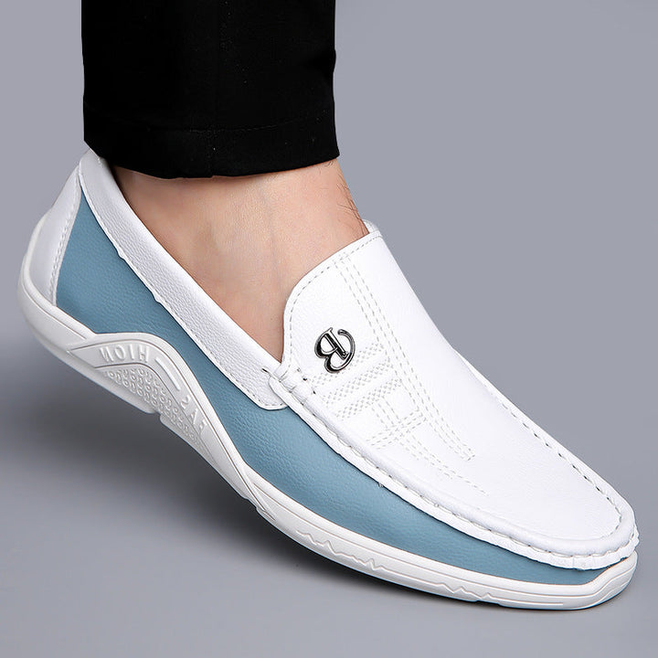 Modern men's two-tone loafers for effortless slip-on style and refined comfort.