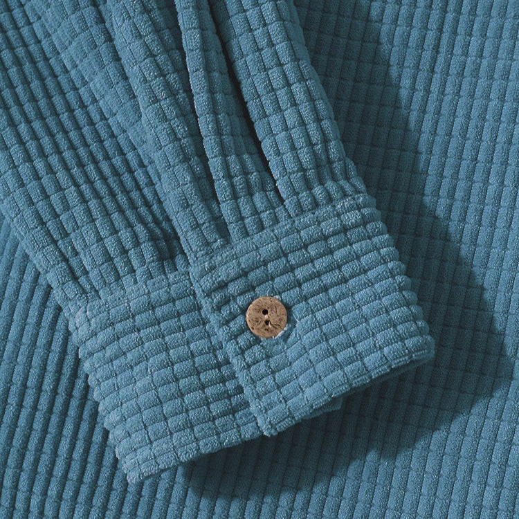 Versatile unisex Brooklyn textured casual jacket with hood. Button-up design for comfortable, stylish outerwear.