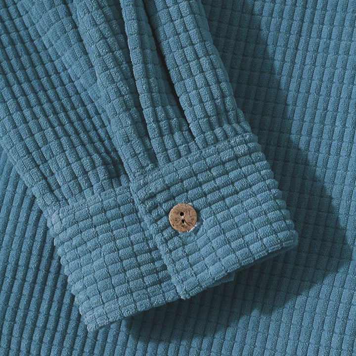 Versatile unisex Brooklyn textured casual jacket with hood. Button-up design for comfortable, stylish outerwear.