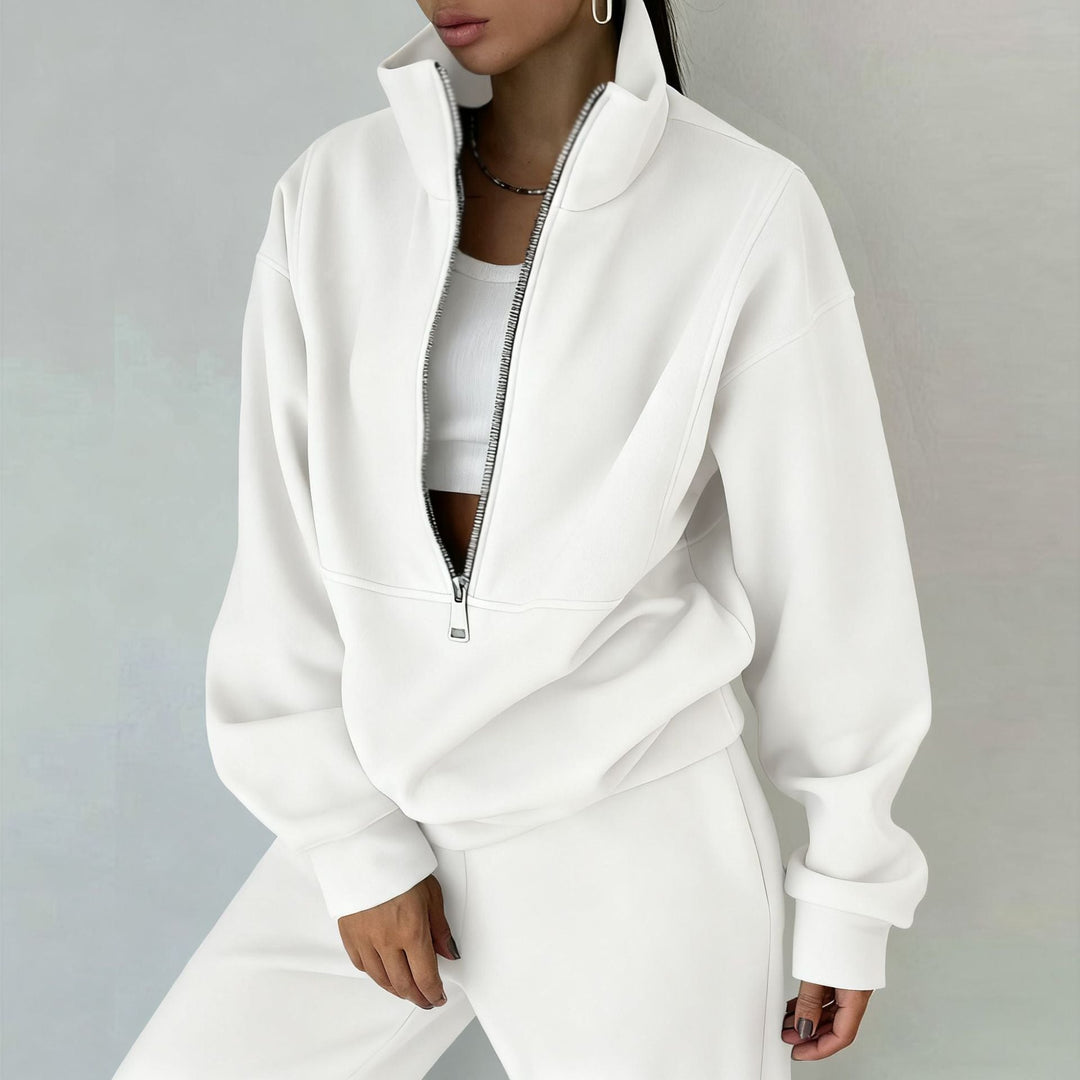 Women's cozy 2-piece sweatsuit featuring a half-zip pullover and stylish high-waisted joggers.