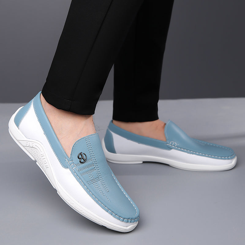Comfortable men's two-tone loafers with an elegant slip-on design for daily wear.