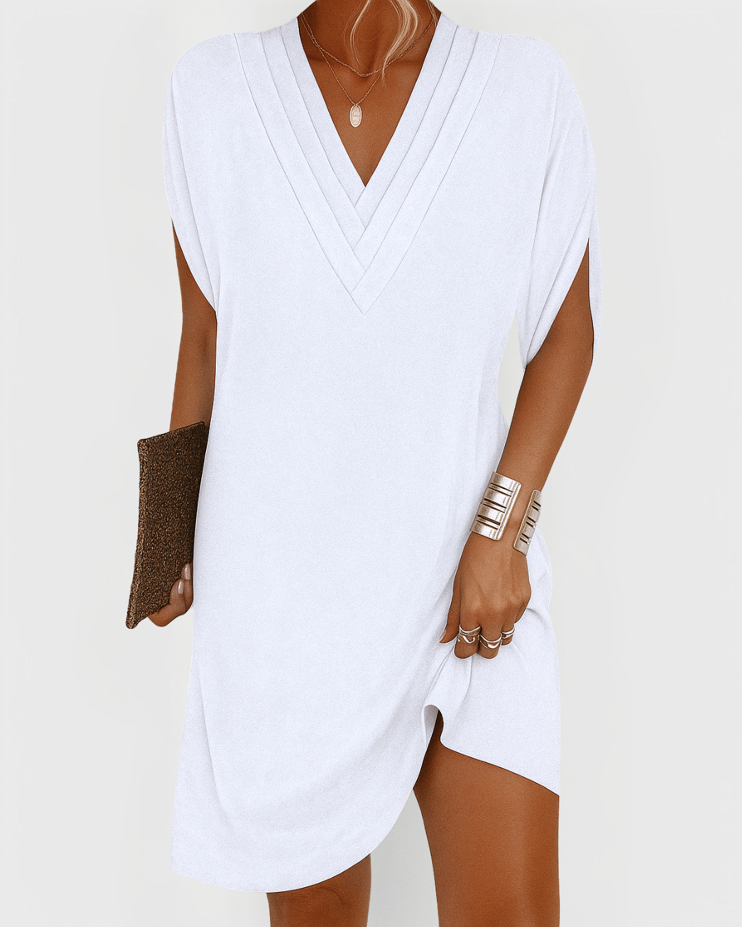 Comfortable & chic V-neck mini dress for women with flowy split sleeves. A stylish summer or party women's fashion dress.