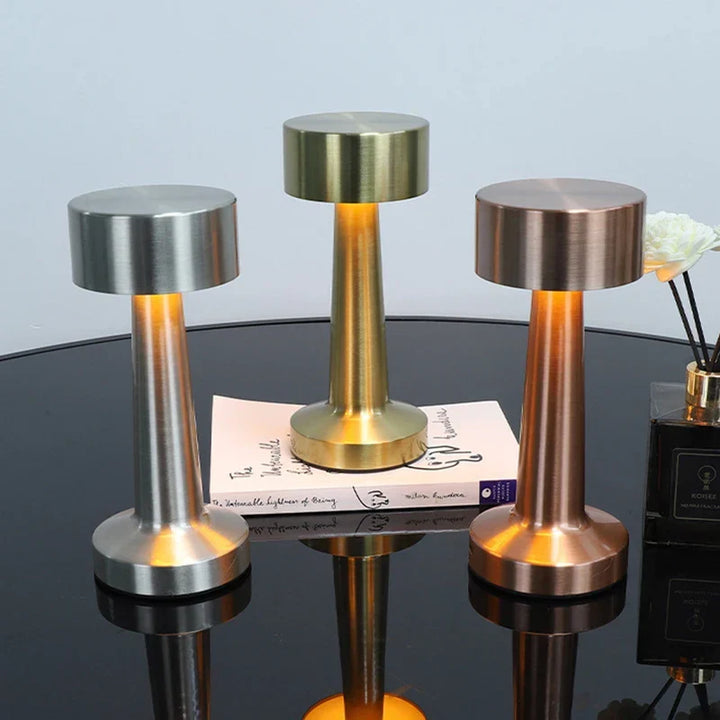 Unisex modern LED lamp, portable and touch-activated, great for desks or bedside tables.
