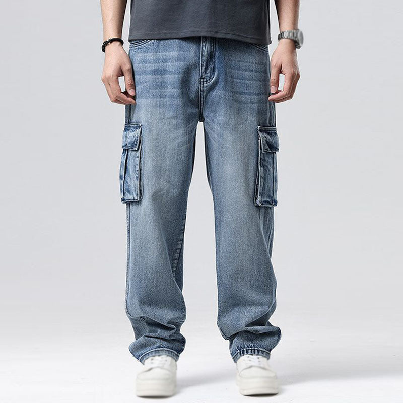 Mens utility cargo jeans, durable blue denim with multiple practical pockets for urban & casual style.