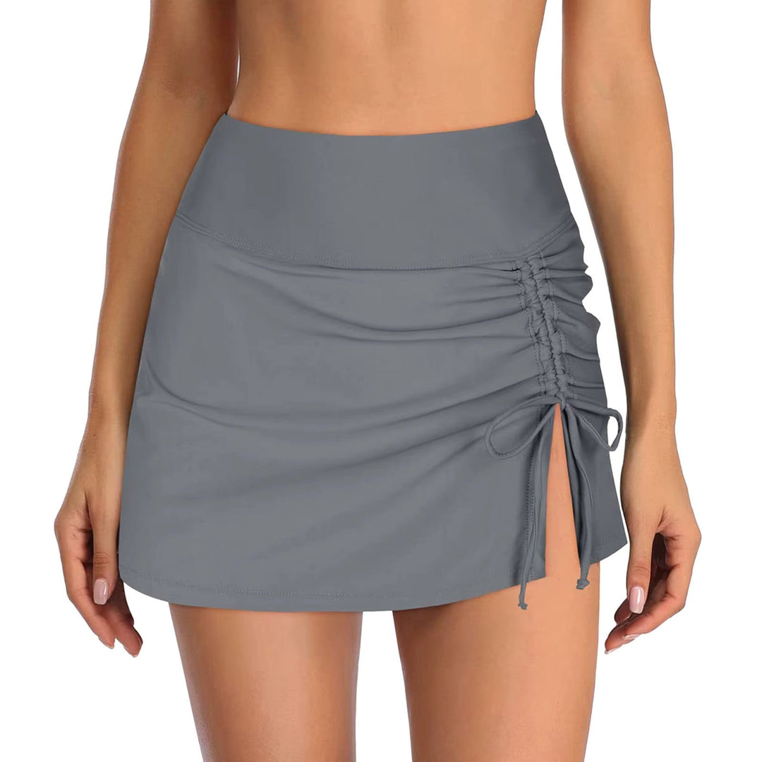 Elegant women's high-waist ruched swim skirt, designed for comfortable and stylish swimming.