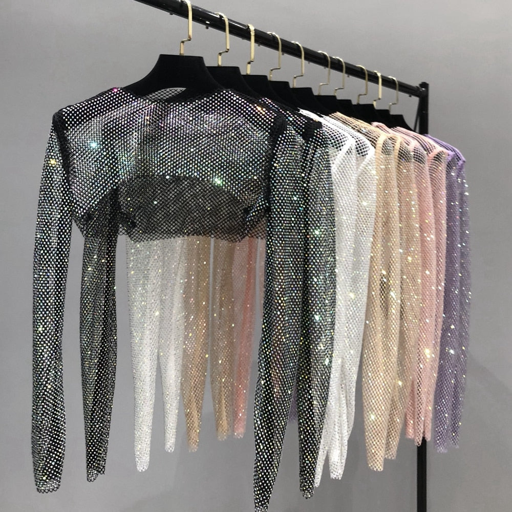 Dazzling women's party net top, perfect for a glamorous night out. Shiny clubwear with sparkle.