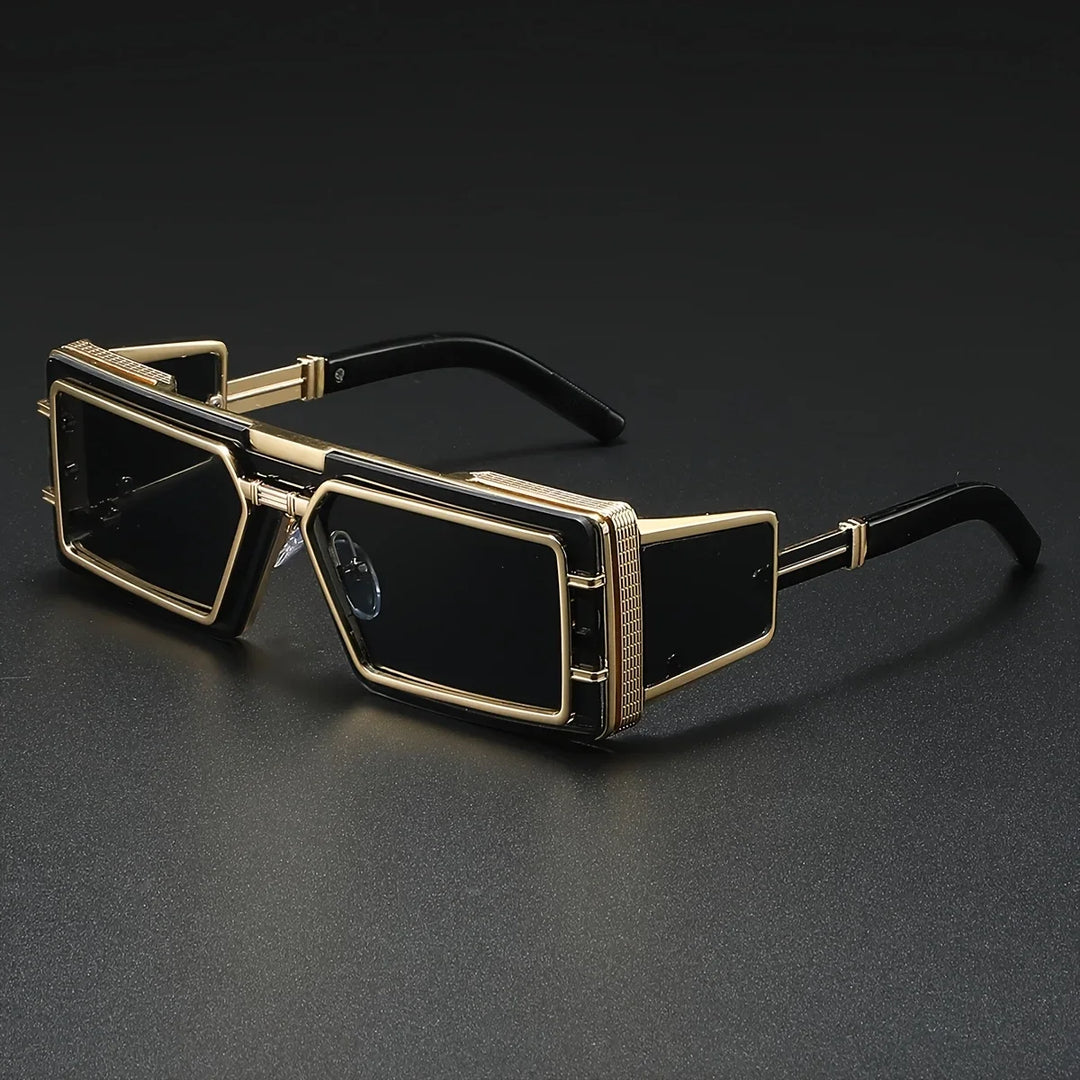 Bold geometric sunglasses providing essential UV protection. Unisex design with statement frames & gold detail.