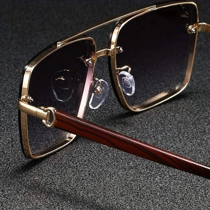 Stylish unisex vintage square shades featuring a metal frame, wooden arms, & gradient UV protective lenses.