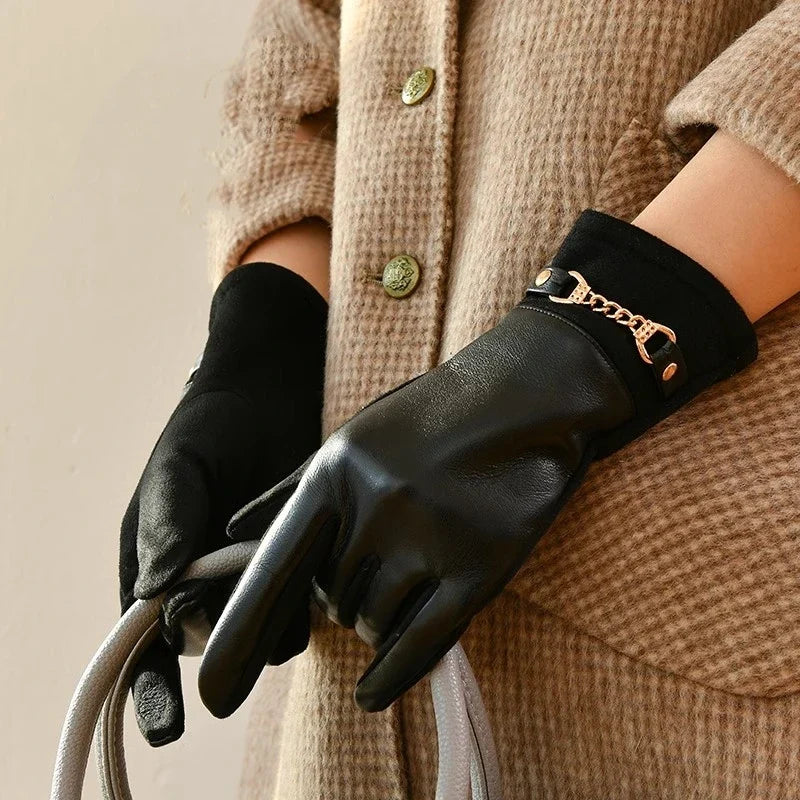 Luxurious women's black leather gloves with soft cashmere lining for elegant winter warmth. Perfect fashion accessory.