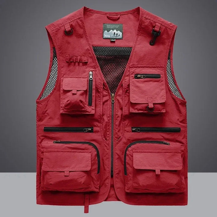 Durable men's utility vest with ample pockets for tools, fishing, or tactical outdoor activities.