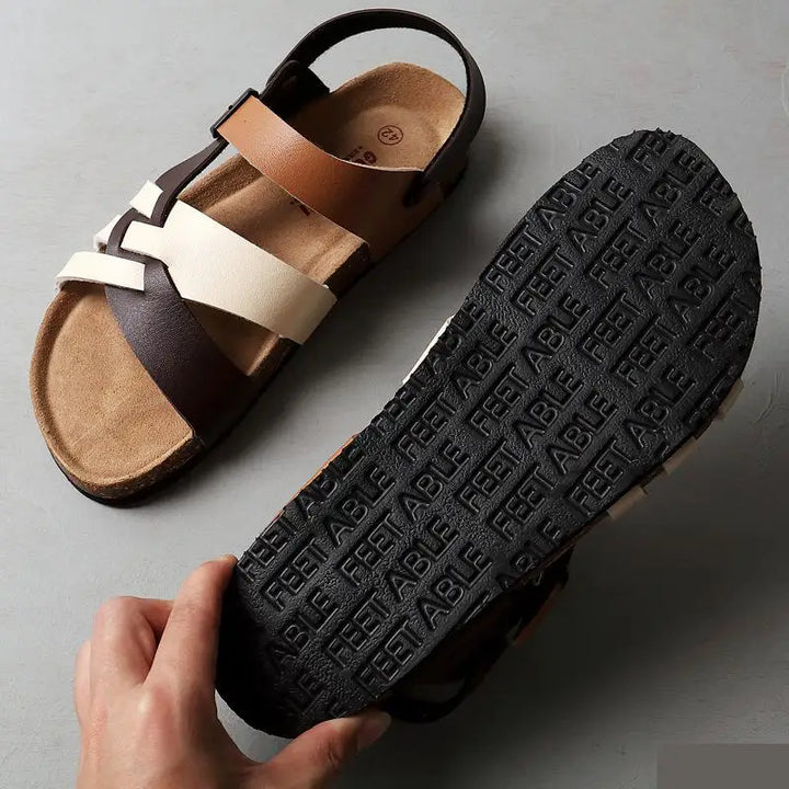Supportive women's walking sandals, featuring adjustable straps and comfortable non-slip sole for active summer days.