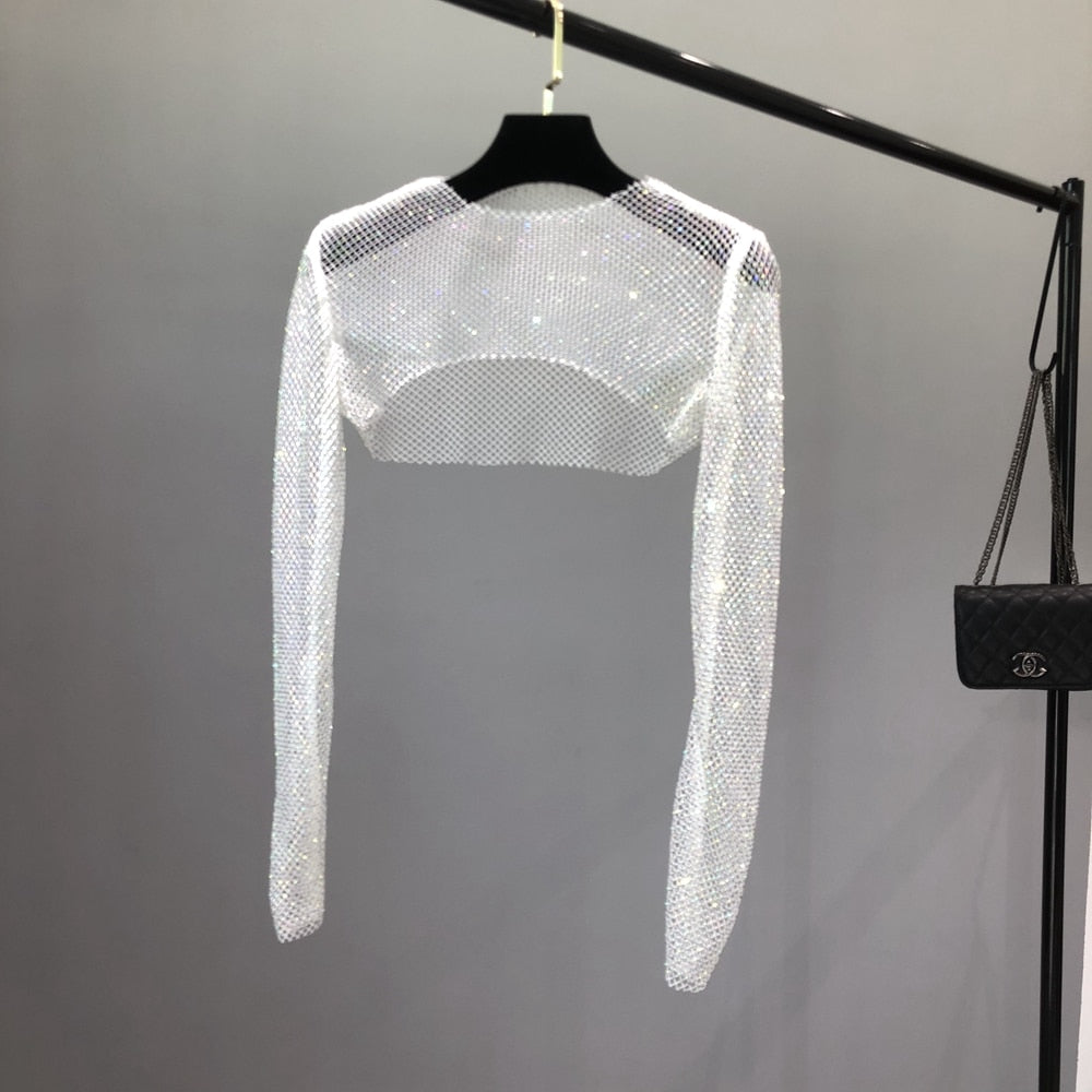 Glamorous shiny net top for women. Ideal clubwear or party outfit, featuring dazzling sparkle.