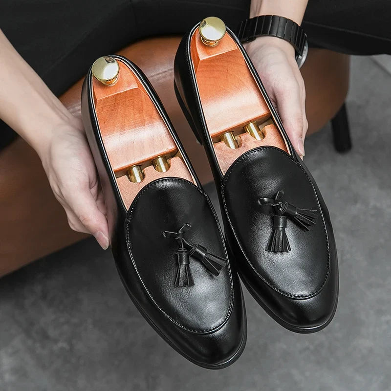 Premium men's leather tasseled loafers, sleek and stylish for modern fashion.