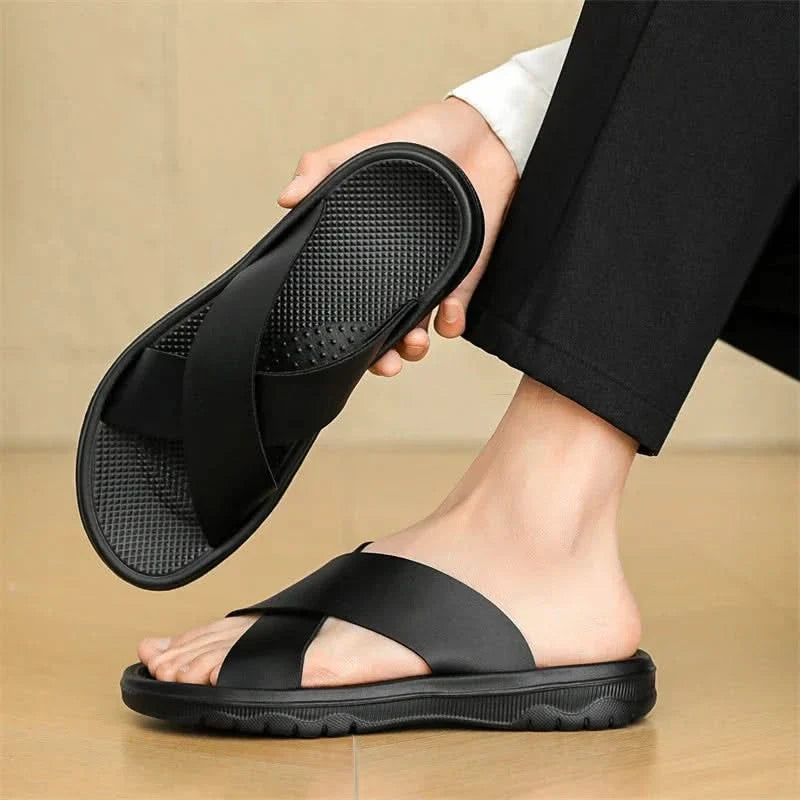 Supportive men's classic strappy comfort sandals. Durable slip-on footwear for casual summer days.