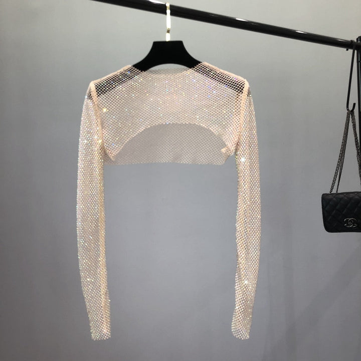 Sparkling women's net top, a dazzling festival outfit or glamorous party wear. Shine bright tonight.