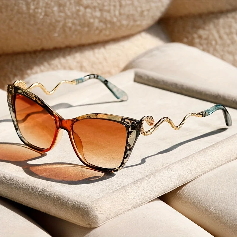 Unisex Serpentina fashion sunglasses, bold modern eyewear accessory for statement style.