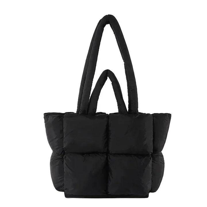 Versatile women's padded shoulder bag, great for work or leisure.