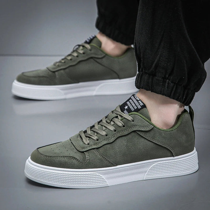 Comfortable men's court sneakers in a modern lace-up design. Versatile everyday footwear for active street wear.