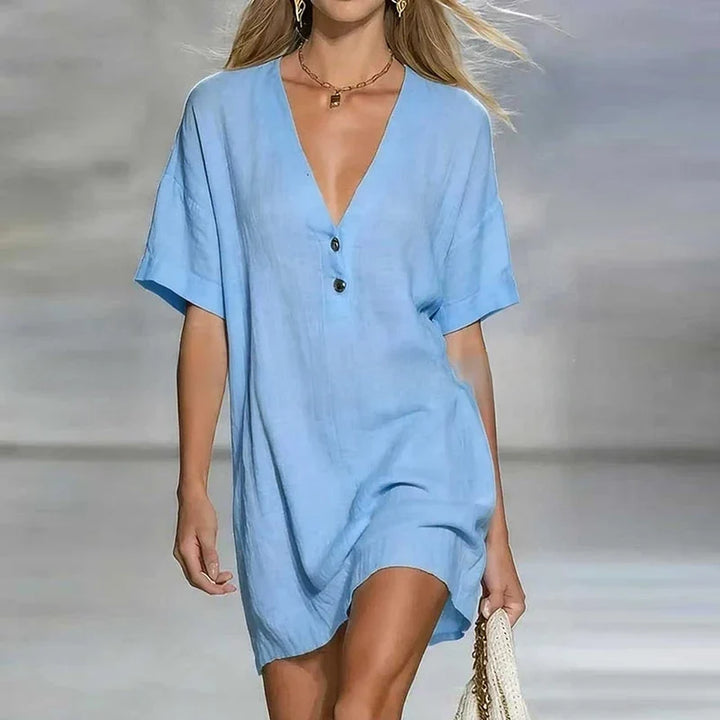 Casual women's V-neck summer dress, perfect as a lightweight shirt dress for beachwear or vacation.