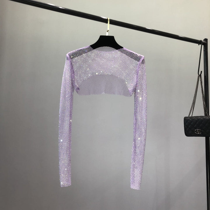 Women's fashion dazzling net top with sparkling details. Perfect for parties, clubs, or festival outfits.