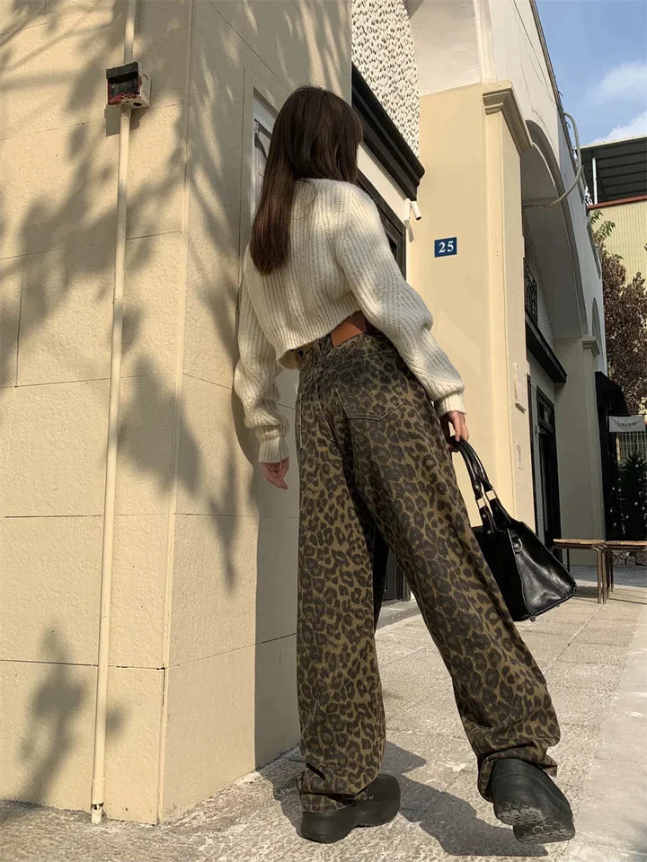 Women's bold leopard print jeans. Trendy, high-waisted fashion pants with a chic animal print for a statement look.