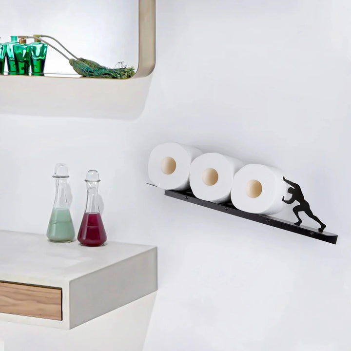 Modern iron freestanding bathroom storage shelf featuring playful design, perfect for toilet paper & towel organization.