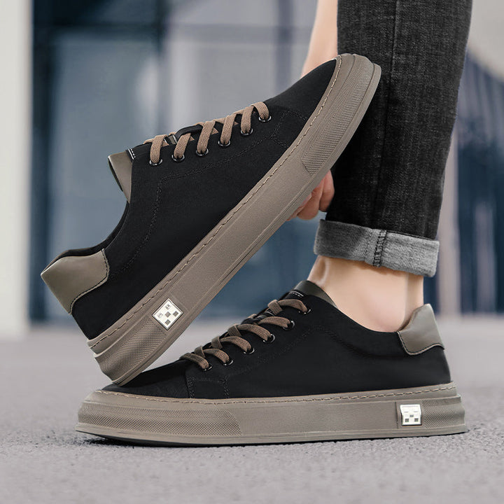 Grey men's lightweight casual sneakers, comfortable everyday footwear for daily walking.