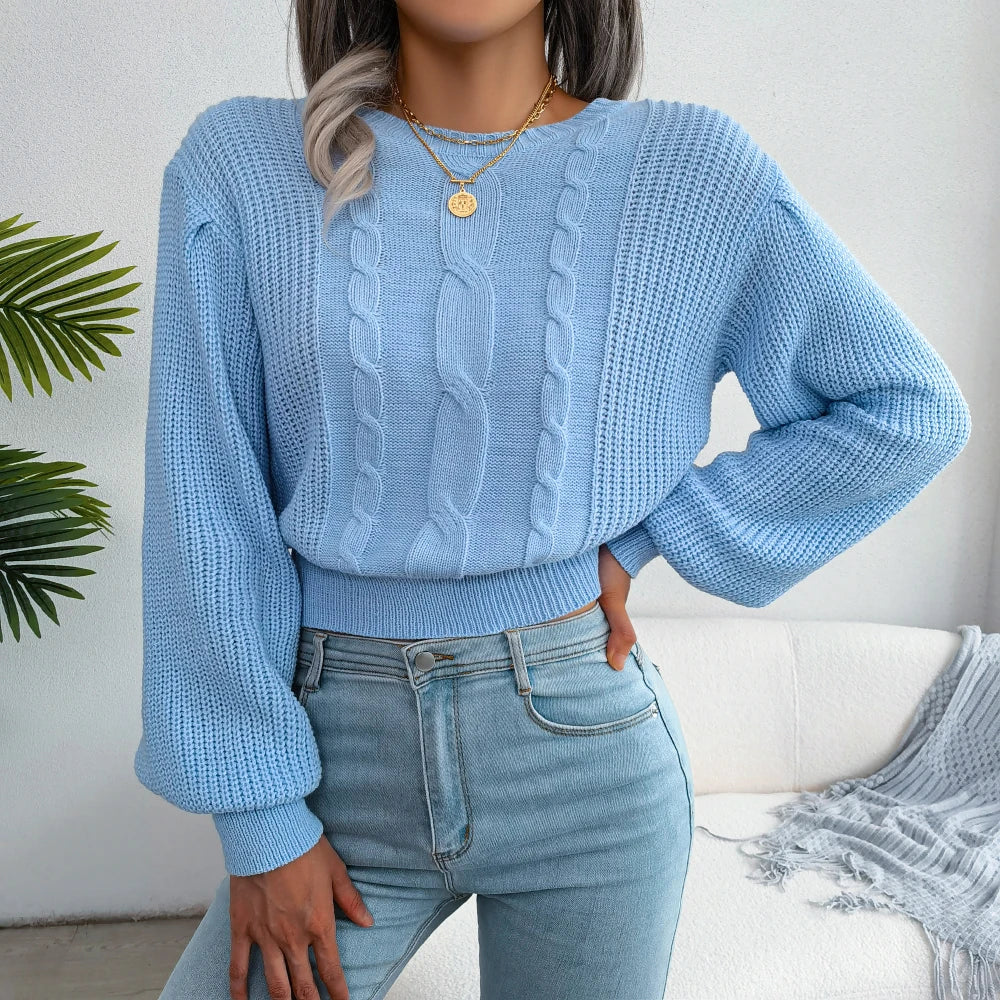 Vibrant yellow cable knit sweater for women, offering cozy warmth and relaxed style for fall fashion.