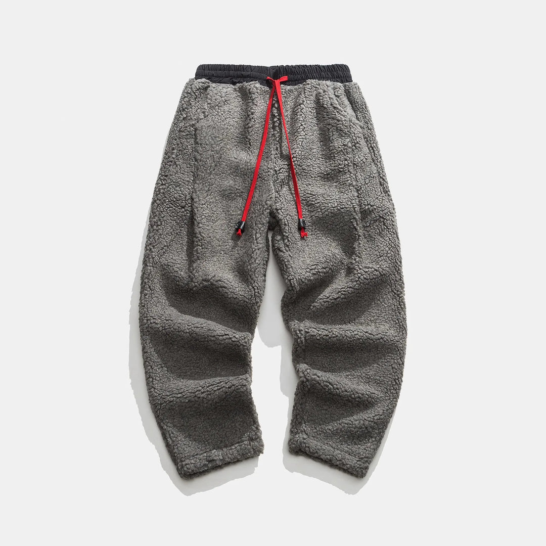 Essential unisex winter comfort pants, warm and relaxed fit for ultimate cold weather coziness.