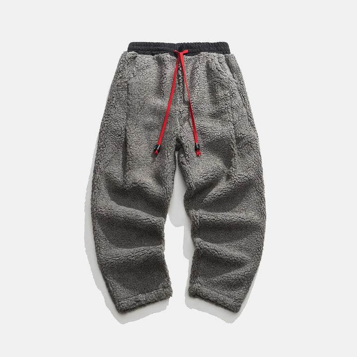 Essential unisex winter comfort pants, warm and relaxed fit for ultimate cold weather coziness.