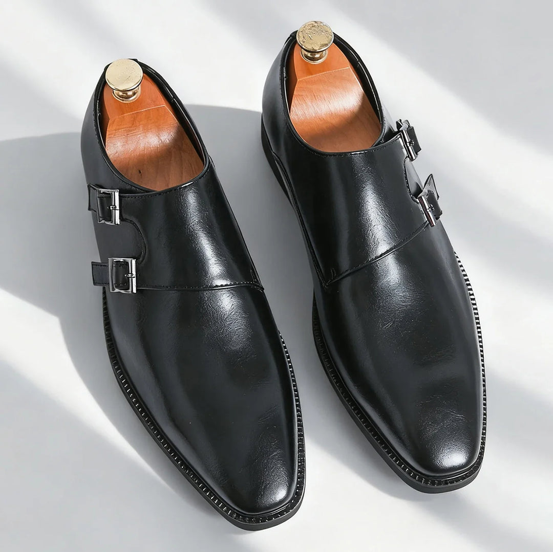Black Valmont men's double buckle loafers, offering sleek sophistication for any formal or work event.