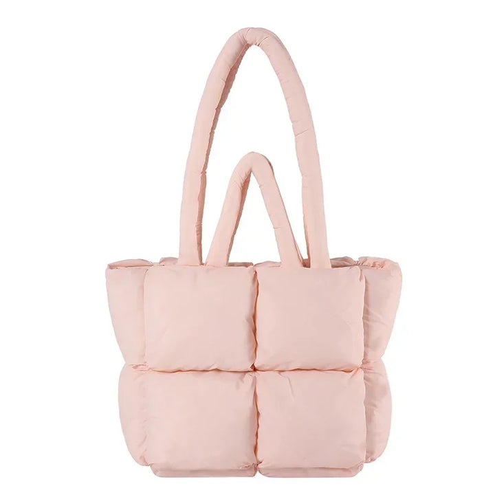 Soft padded shoulder bag for women, roomy and versatile accessory.