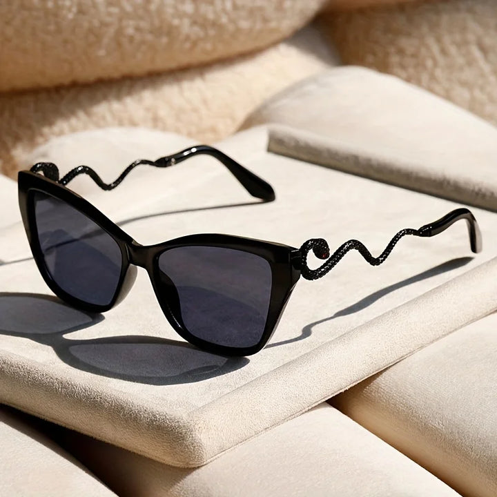 Model wearing bold Serpentina unisex fashion sunglasses, enhancing personal style & eyewear accessory.