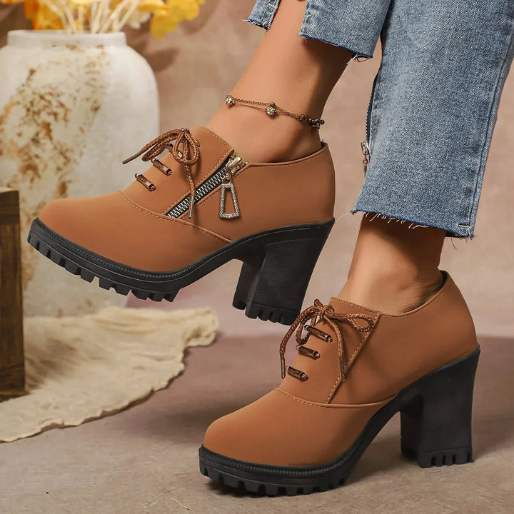 Full view of stylish women's lace-up block heels, showcasing elegant design and sturdy heel.