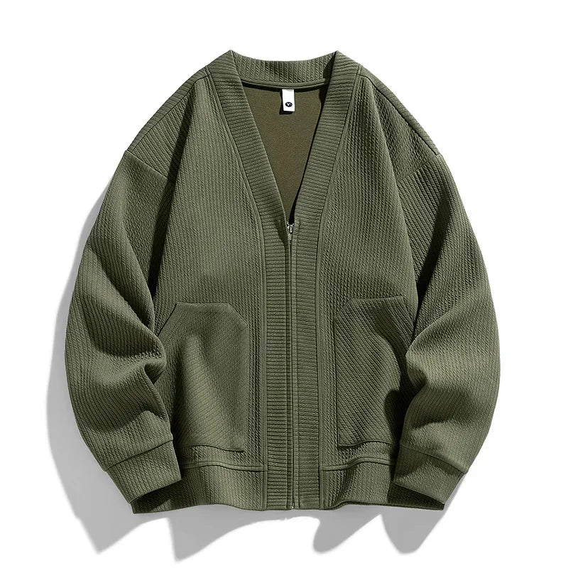 Green men's relaxed fit zip-up sweater, casual and comfortable for everyday wear. Perfect layering piece.