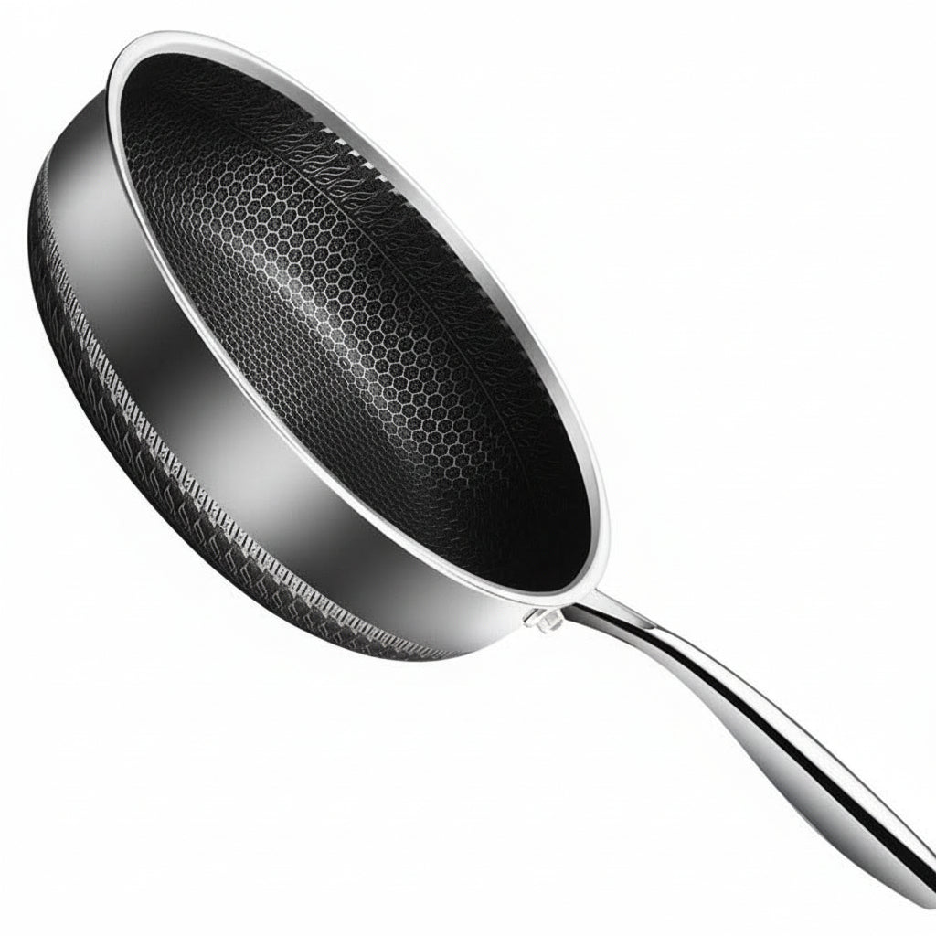 Versatile stainless steel frying pan, essential for even cooking and professional results; induction and oven safe.
