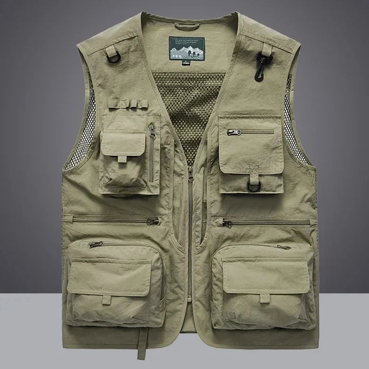 Versatile men's fishing & tool vest with multiple pockets. Rugged and breathable for outdoor tasks.