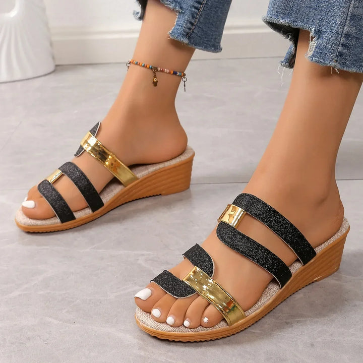 Shimmering women's strappy sandals, comfortable for evening events.